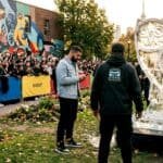 Drake beside ice-block stunt at Toronto plaza