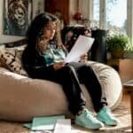 Hip hop artist reviewing music catalog pages