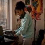 Independent artist working in home recording studio