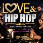 Cast of Love & Hip Hop with city skyline background.