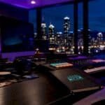 Music production setup with MIDI keyboard and monitors