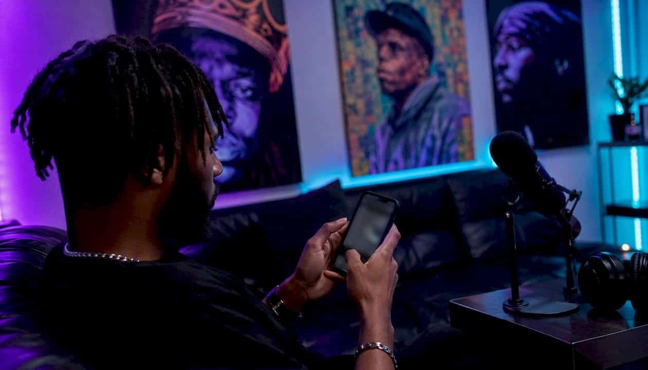 Artist enabling SoundCloud monetization on smartphone
