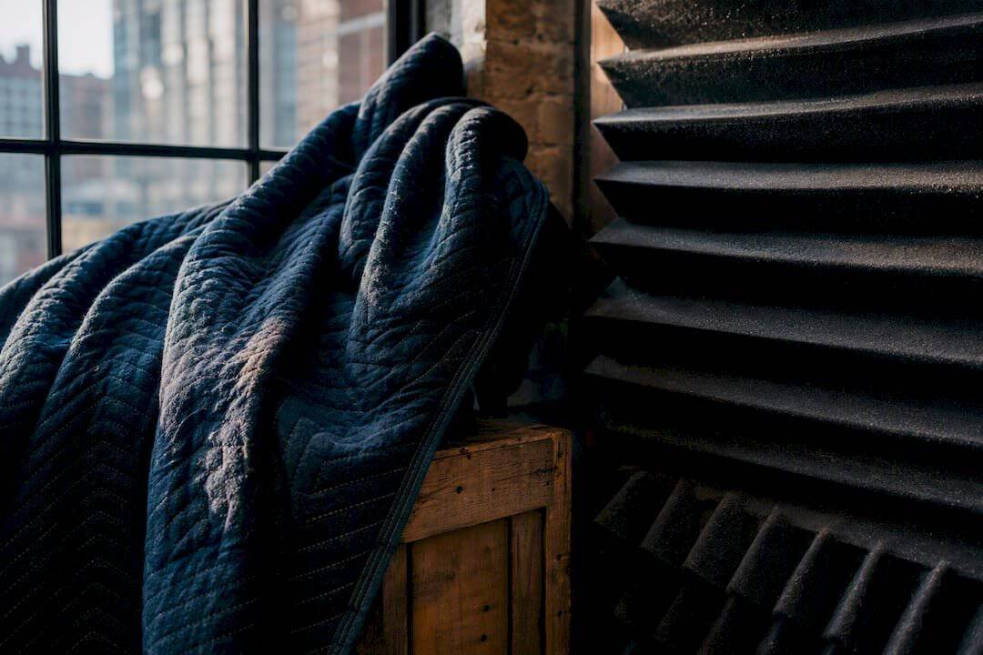 Thick moving blanket and acoustic foam close-up