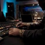 Producer adjusting digital audio interface