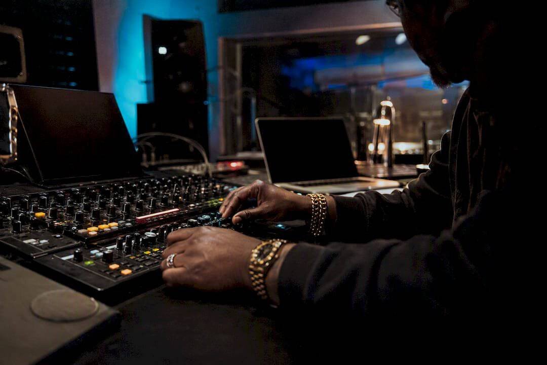 Producer adjusting digital audio interface