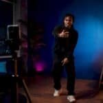 Artist filming TikTok hook performance