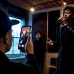 Fan recording independent rapper performance