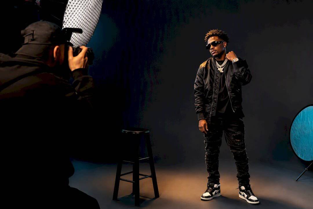 Hip-hop artist posing for press photos